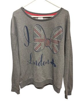 This item is a Disney Store London Minnie Mouse crewneck size XL